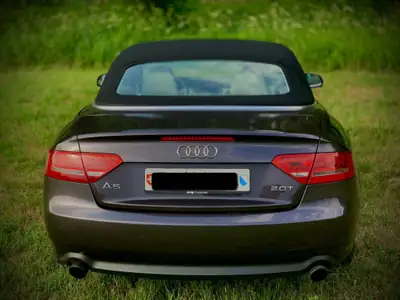 Audi A5 Cabrio 2010 — Cabriolet sportif élégant, moteur 2.0 TFSI 211 ch — Seitenansicht