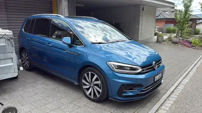 VW Touran 1.5 TSI R-LINE — Monospace familial 7 places, motorisation moderne et fiable — Seitenansicht