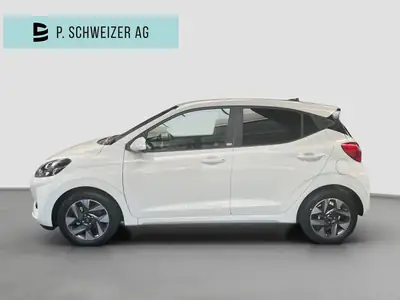 Hyundai i10 1.2 Amplia Aut. — Citadine maligne, quasi neuve et ultra-compacte — côté