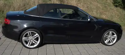 Audi S5 Cabriolet — Sportivité décapotable, 333 ch et prestige allemand — side view