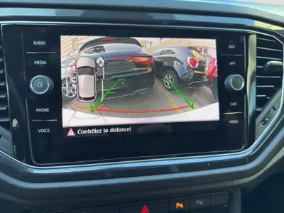 VW T-Roc 1.5 TSI EVO Sport DSG — SUV urbain dynamique, entretien suivi — détail