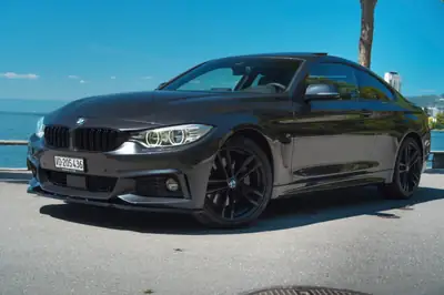 BMW 435i xDrive — Coupé sportif 306 ch, transmission intégrale, entretien exemplaire — côté