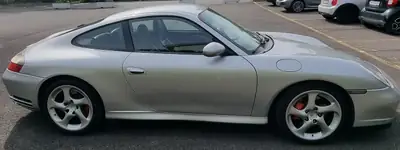 Porsche 911 3.6 Carrera 4S — Coupé sportif légendaire, 320 ch et traction intégrale — Heckansicht