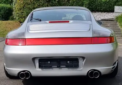 Porsche 911 3.6 Carrera 4S — Coupé sportif légendaire, 320 ch et traction intégrale — Seitenansicht