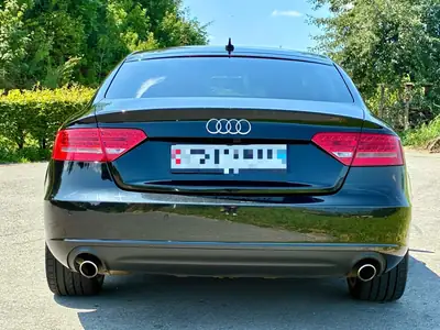 Audi A5 3.0 TDI V6 Quattro — Berline élégante, moteur premium, transmission intégrale — vista posteriore
