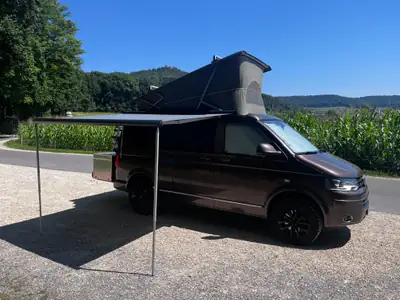 VW T5 2.0 TDI 180 — Camping-car 4×4 spacieux, parfait pour l'aventure en famille — vue extérieure