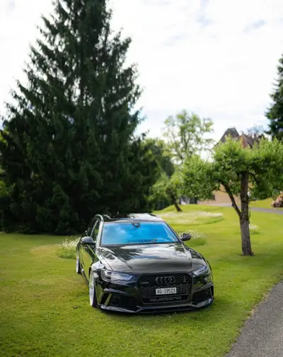 Audi RS6 Avant 4.0 V8 TFSI — Performance et élégance, 86 500 km seulement — fianco