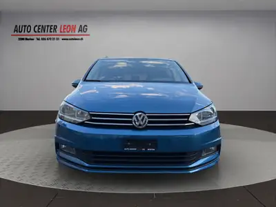 VW Touran 1.4 TSI BlueMotion — Monospace familial fiable, toit panoramique et 8 places — vue extérieure