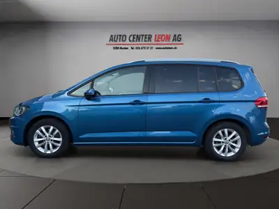 VW Touran 1.4 TSI BlueMotion — Monospace familial fiable, toit panoramique et 8 places — arrière