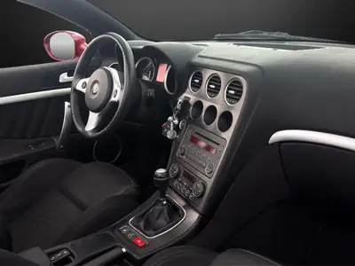 Alfa Romeo Spider 2.2 JTS 185 ch — Cabriolet sportif rouge, entretien frais — détail