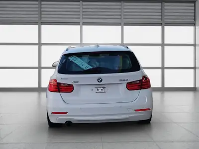 BMW 320i xDrive Touring — Break polyvalent, transmission automatique, contrôle intégral — tableau de bord