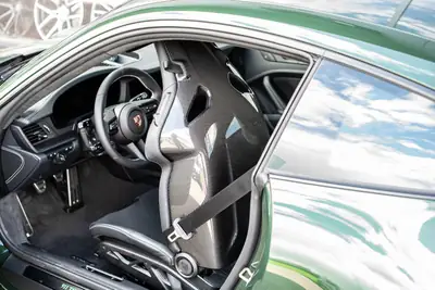 Porsche 911 Carrera GT3 Touring 2026 — Légende manuelle en Oak Green Metallic, 1200 km — Miniature 25