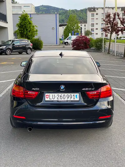 BMW 420d xDrive Coupé — Diesel performant, contrôle intégral et économie assurée — vista posteriore