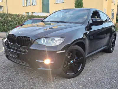 BMW X6 40d xDrive — SUV coupé premium diesel, traction intégrale fiable — side view