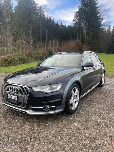 Audi A6 Allroad 3.0 V6 TDI 245 — Break tout-terrain robuste et spacieux — Heckansicht