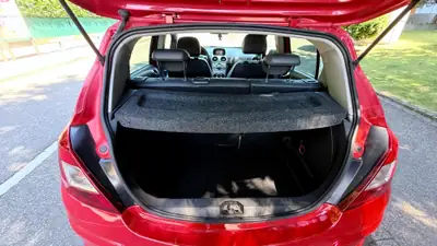 Opel Corsa 1.4 TP Color Edition — Citadine pétillante, rouge métallisé, 120 000 km — Miniature 7