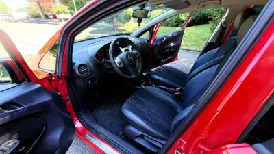 Opel Corsa 1.4 TP Color Edition — Citadine pétillante, rouge métallisé, 120 000 km — Miniature 10