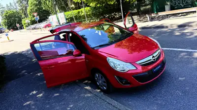Opel Corsa 1.4 TP Color Edition — Citadine pétillante, rouge métallisé, 120 000 km — Miniature 14