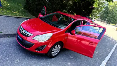 Opel Corsa 1.4 TP Color Edition — Citadine pétillante, rouge métallisé, 120 000 km — Miniature 15