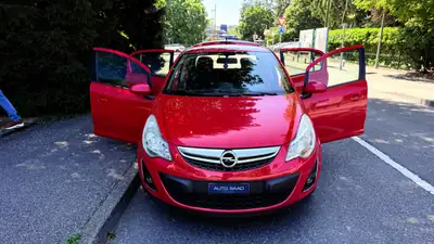 Opel Corsa 1.4 TP Color Edition — Citadine pétillante, rouge métallisé, 120 000 km — Miniature 13