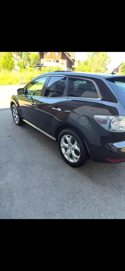 Mazda CX-7 2013 — SUV robuste diesel, 163'000 km, sans sinistre — rear view