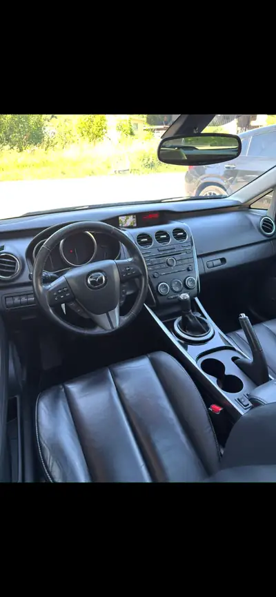 Mazda CX-7 2013 — SUV robuste diesel, 163'000 km, sans sinistre — dashboard