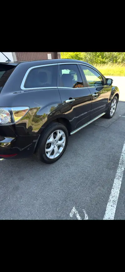 Mazda CX-7 2013 — SUV robuste diesel, 163'000 km, sans sinistre — interior