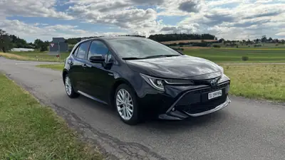 Toyota Corolla 2.0 HSD Trend — Hybride performant, consommation ultra-économique — vista posteriore