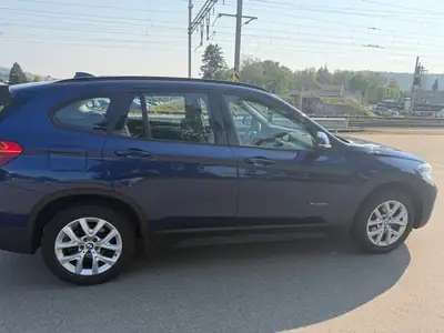 BMW X1 xDrive 18d — SUV compact diesel fiable, entretien impeccable — côté