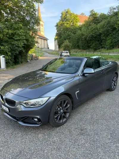 BMW 428i xDrive Cabriolet — Élégance décapotable, moteur performant et traction intégrale — vista esterna