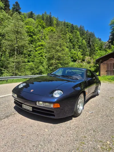 Porsche 928 5.0 Strosek 1988 — Coupé sportif mythique, préparation exclusive — fianco
