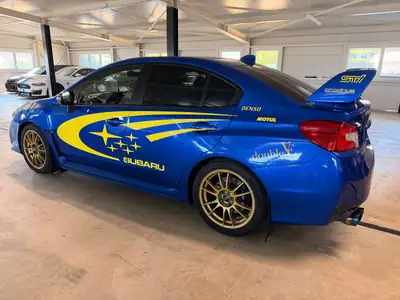 Subaru WRX STI 2.5 — Berline sportive haute performance, 147 900 km — side view