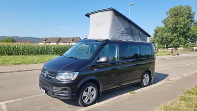 VW T6 California Beach 4Motion — Camping-car 7 places diesel, 4x4 intégral — exterior view