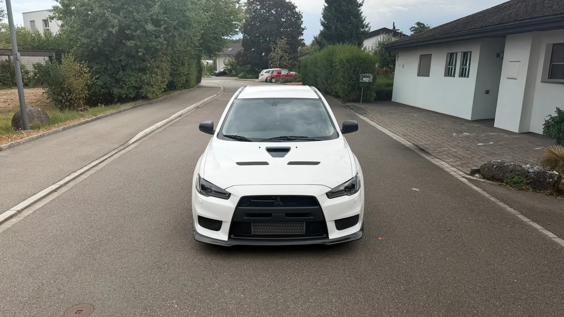 Mitsubishi Lancer Evo X Final Edition — Sportive légendaire, 295 ch et transmission manuelle — vista esterna