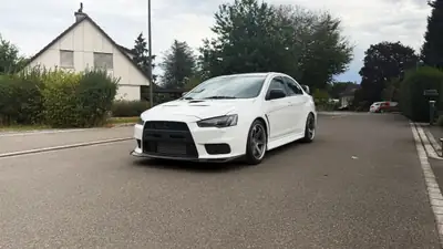 Mitsubishi Lancer Evo X Final Edition — Sportive légendaire, 295 ch et transmission manuelle — côté
