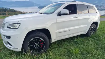 Jeep Grand Cherokee 3.0 CRD 250 Summit — SUV premium diesel, 103'000 km, toit blanc — côté