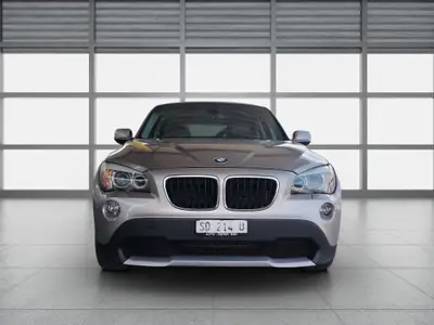 BMW X1 xDrive 18d — SUV compact diesel fiable, entretien à jour — côté