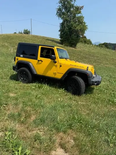 Jeep Wrangler Rubicon — SUV légendaire diesel 200 ch, traction intégrale incontournable — fianco