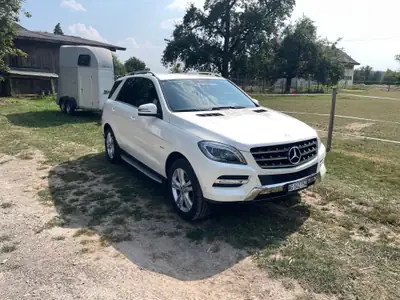 Mercedes-Benz ML 350 CDI BlueTec — SUV premium diesel, 209 000 km, sans sinistre — côté
