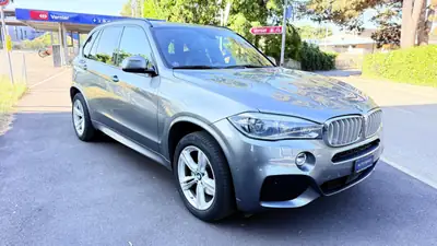 BMW X5 xDrive 40e iPerformance — SUV hybride rechargeable haute performance, 122'000 km — côté