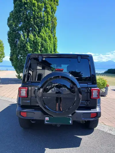 Jeep Wrangler 2.0 Turbo Sahara Unlimited 4xe — Hybride rechargeable, 90'000 km seulement — intérieur