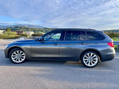BMW 320i xDrive Touring — Familiale Premium All-Wheel Drive, 140 000 km, Historique complet — interior