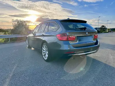 BMW 320i xDrive Touring — Familiale Premium All-Wheel Drive, 140 000 km, Historique complet — detail