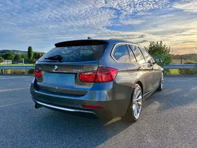 BMW 320i xDrive Touring — Familiale Premium All-Wheel Drive, 140 000 km, Historique complet — dashboard