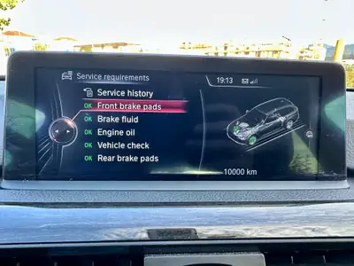 BMW 320i xDrive Touring — Familiale Premium All-Wheel Drive, 140 000 km, Historique complet — Thumbnail 14