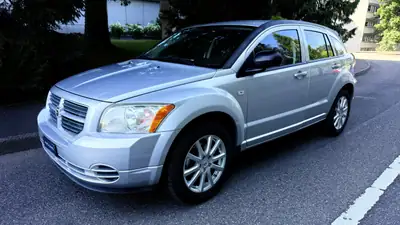 Dodge Caliber 2.0 — Compacte polyvalente, moteur fiable 156 ch, sans sinistre — côté