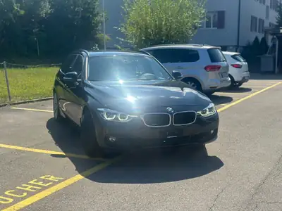 BMW 320i xDrive Luxury Line — Break élégant, transmission intégrale, entretien maîtrisé — side view