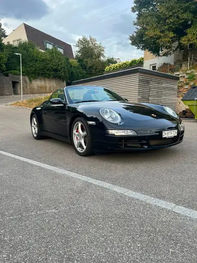 Porsche 911 Carrera 4S 3.8 Cabriolet — Sportive mythique, hard-top neuf, 104 000 km — side view