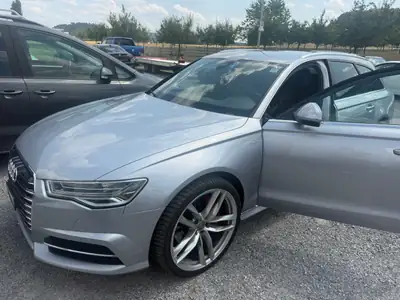 Audi A6 Avant 3.0 BiTDI Quattro — Break premium 326 ch, transmission tiptronic, traction intégrale — vue extérieure