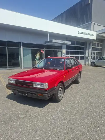 Nissan Sunny 1.6 SGX — Berline compacte de 1988, authentique et fiable — exterior view